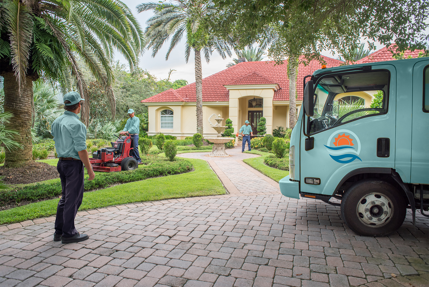 Ocean View Landscape Management crew on a residential property
